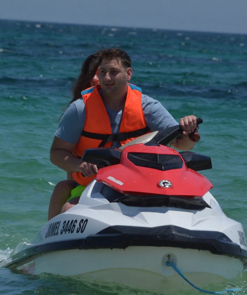 Stefan, founder of Valyrian Management, on a jet ski